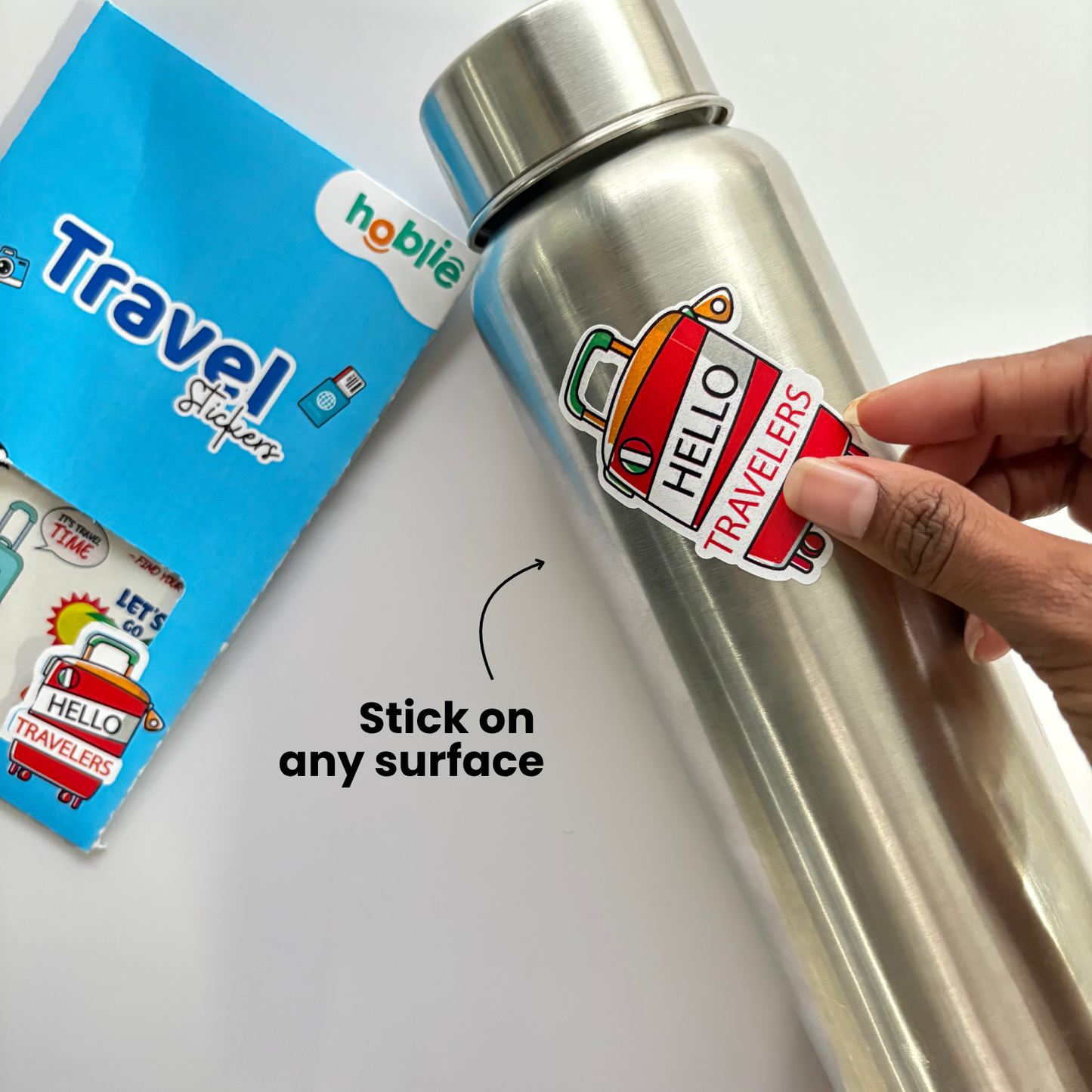 Silver water bottle with a 'Hello Travelers' sticker on a white background